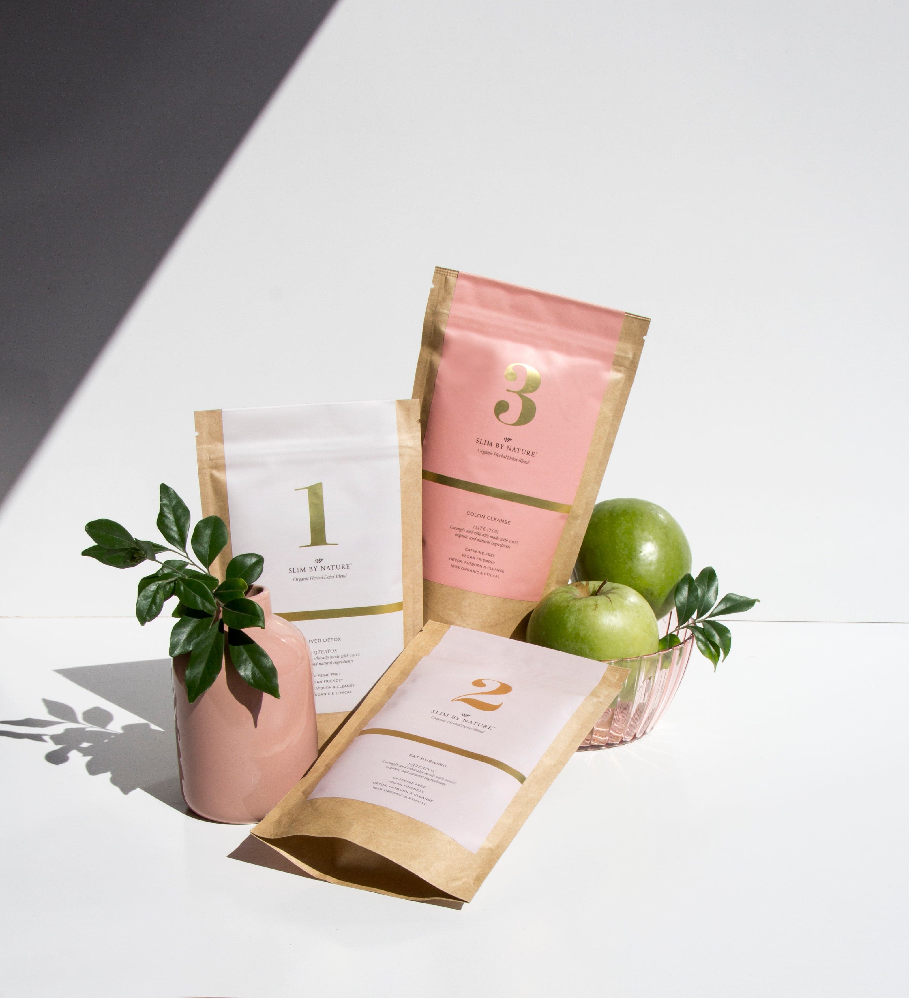 Slim By Nature phase 1, 2 and 3 program pouches with green apples